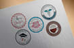 design a professional circle, stamp, badge colored logo