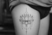 do small, minimalistic, ornamental fine line tattoo design