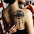create small, minimalistic, ornamental fine line tattoo