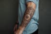 create sleeve tattoo design in geometric style