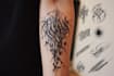 not design an average calligraphy tattoo