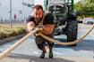 create a personalized strongman training plan
