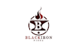 design captivating black iron pizza logo