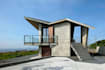 render coastal modern villa,timber cladding,rooftop solar panel,concrete facades