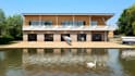 design a realistic 3d boathouse, marina, dock house, or waterfront cabin