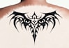 design small tribal tattoo with elegant pattern