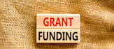 write a grant proposal and design a logic model and pmf