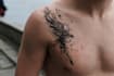 custom an abstract black tattoo design