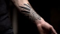 custom an abstract black tattoo design
