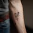 design a professional modern tattoo logo