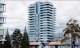 redesign highrise residential building, cantilevered balconies, facade structure