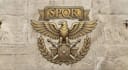 design a powerful and elegant roman style logo