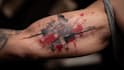create a custom trash polka tattoo design