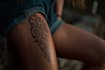 do a spiritual tribal tattoo art with custom pattern