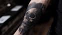 make a realistic black and white tattoo design for you