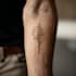 design a custom fine line minimal tattoo