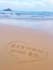 write your custom birthday wish on beach sand as a video