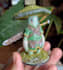 create a hand painted 3d figurine sculpture of a character