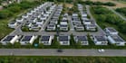develop residential housing 3d model from site map, aerial view township render