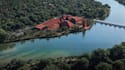 remodel stunning university building, river front school design,facade red brick