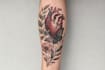 create a realism tattoo design with professional artwork