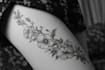 create a cute minimalistic line art tattoo design
