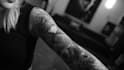 make a realistic black and white tattoo design for you