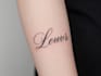 design a delicate fine line tattoo lettering