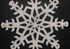 cut out Five Unique Individual Paper Snow Flakes