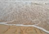 write your message creatively on a beach as  video or photo