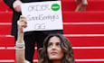 make a celebrity or model hold your product, sign, or logo