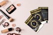 design feminine beautiful makeup cosmetic flyer and cards