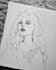 draw a portrait in pencil and markers or watercolors