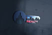 design stunning real estate logo