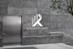 design attractive real estate logo