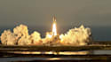 make space shuttle flying over earth animation