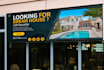 create any kind of billboard, banners, signage, yard sign, street signs
