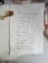 write antique handwritten text in white cotton paper