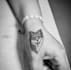 design a custom hand tattoo with experience as tattoo artist