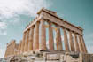 create a personalized travel itinerary for greece based on your budget