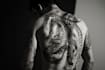 make a realistic black and white tattoo design for you