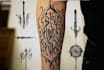 create arabic and persian minimal calligraphy tattoo