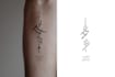 create arabic and persian minimal calligraphy tattoo
