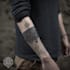 create sleeve tattoo design in geometric style