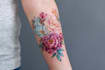 create a beautiful watercolor flowers tattoo design