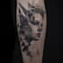 custom a geometric realism in black and grey tattoo design