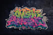design a graffiti logo with spray paint textures