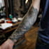 create a tattoo design of tattoo sleeve