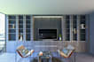 design a modern custom TV wall unit and media wall in 3d