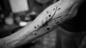 custom an abstract black tattoo design